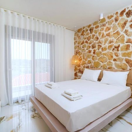 Athina Palace Luxurious Appartments Potos Extérieur photo