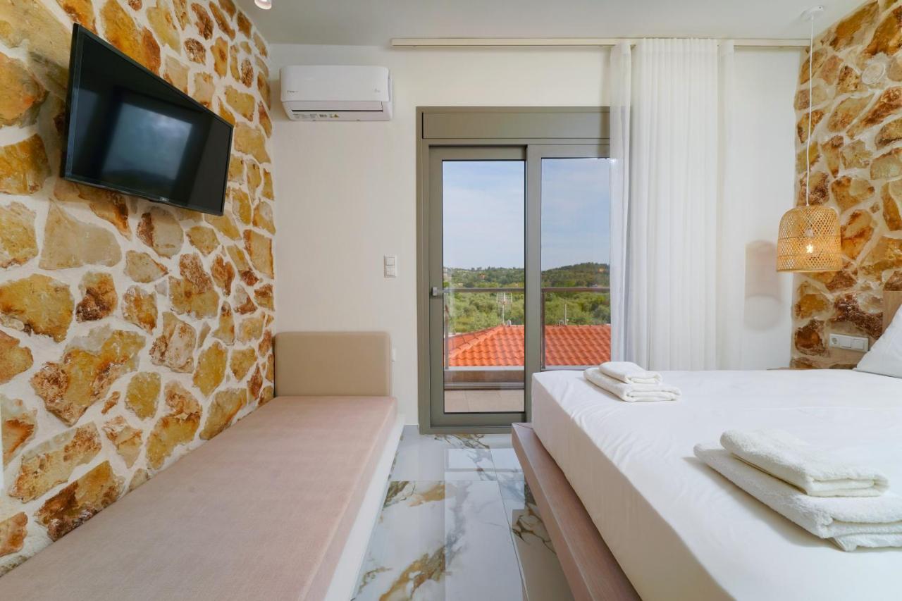 Athina Palace Luxurious Appartments Potos Extérieur photo