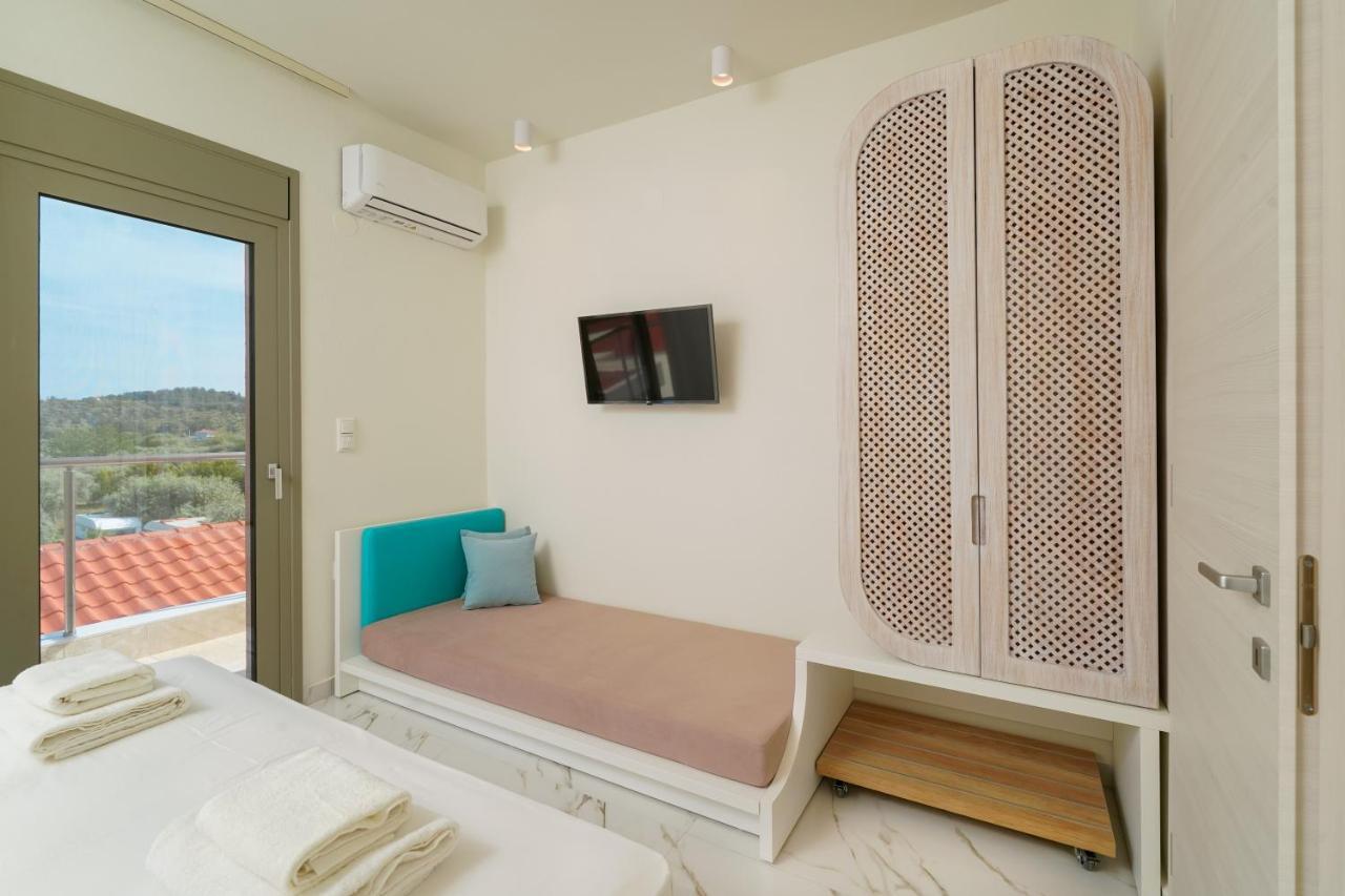 Athina Palace Luxurious Appartments Potos Extérieur photo